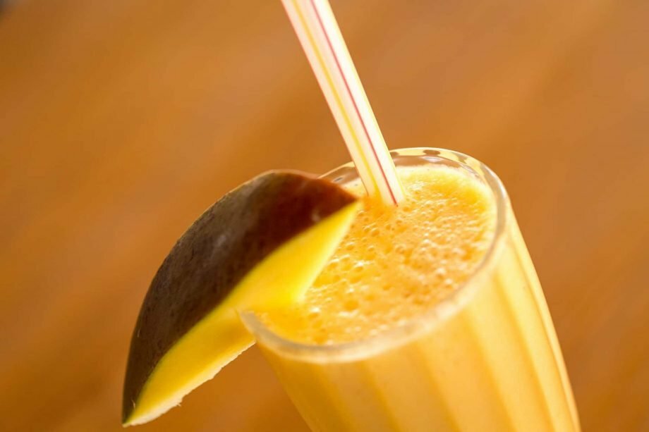 mango juice with straw