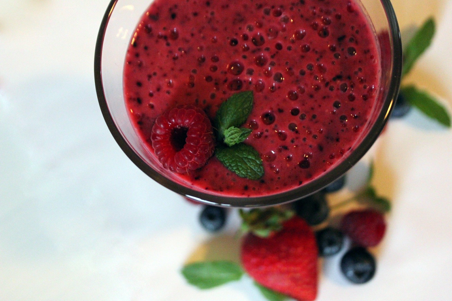 glass red fruit smoothie